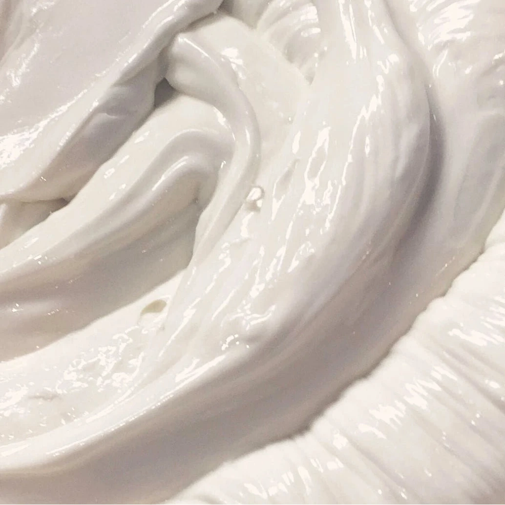 Close-up of creamy texture of Antioxidant Botanical Moisturiser by Dope Skin, showcasing its lightweight and hydrating properties.