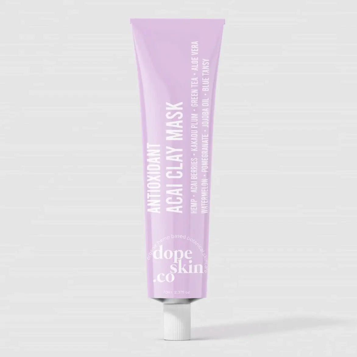 Purple clay mask tube with 'dope skin co' branding on a white background