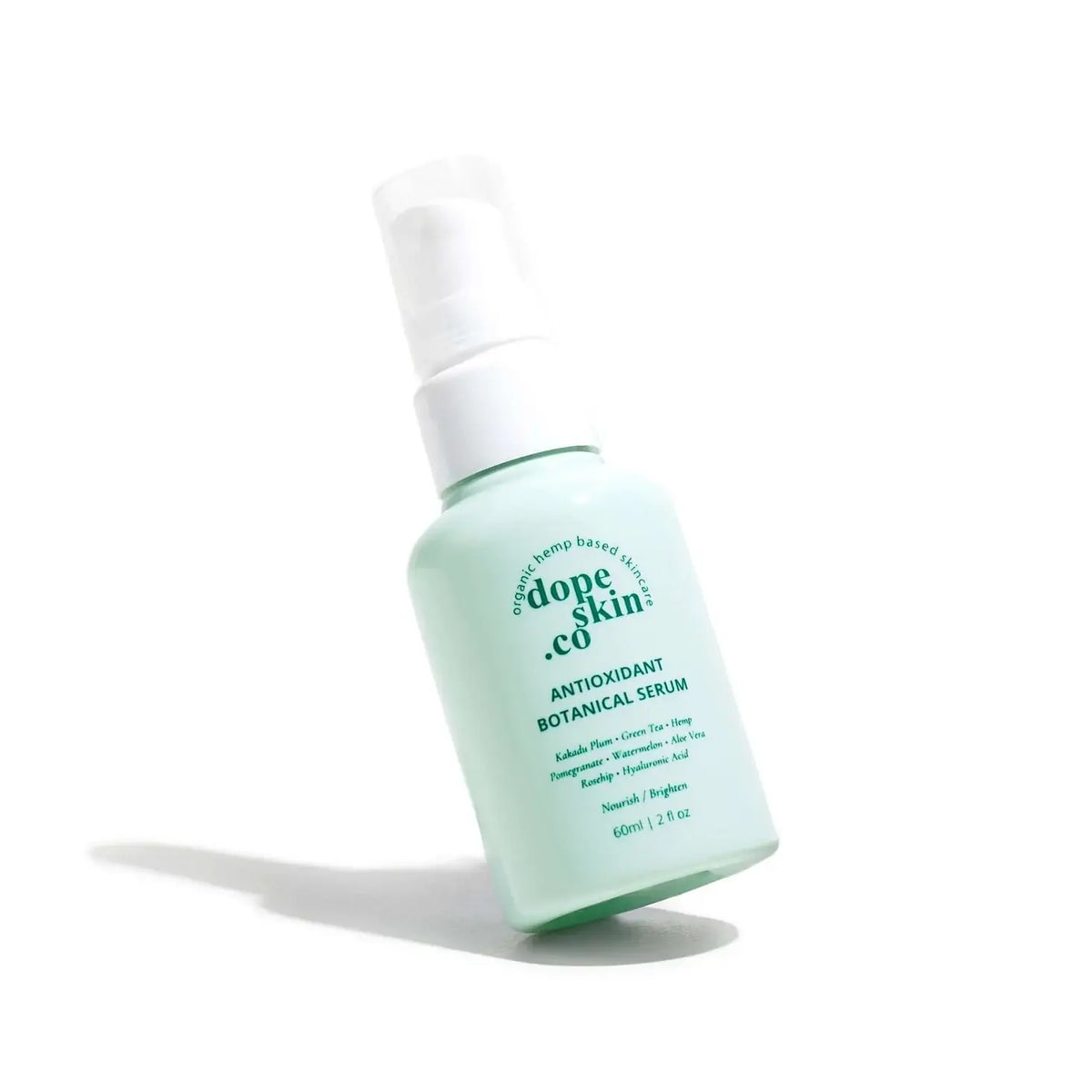 Skincare serum bottle with 'dope skin co.' branding on a white background