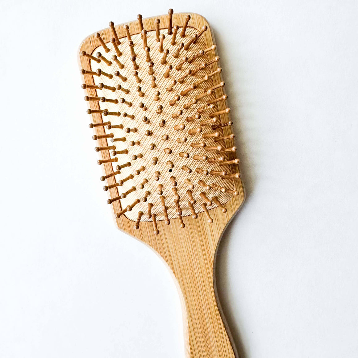 Bamboo Hair Brush with large bristles designed to reduce static and frizz for all hair types.