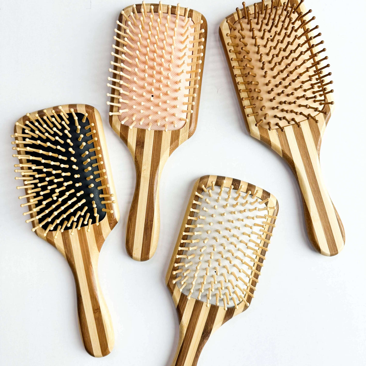 Bamboo Hair Brush - Smile Boutiques set with natural wooden bristles for gentle detangling and healthy hair.