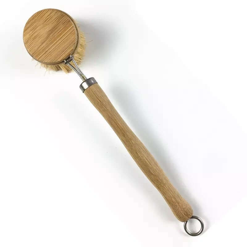 Two wooden cleaning brushes on a white background