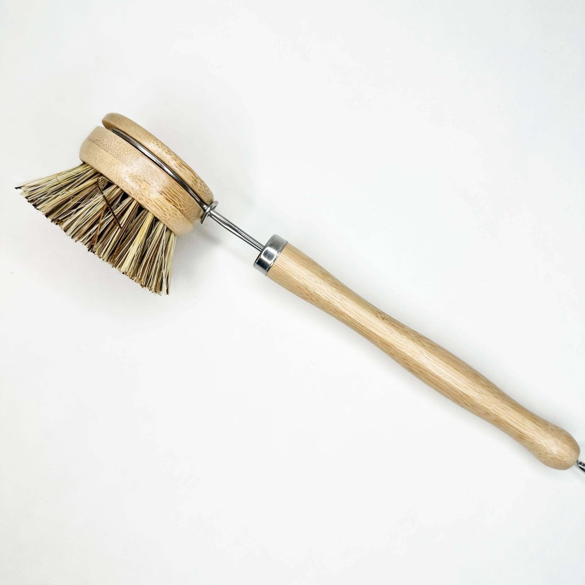 Bamboo Sisal Dish Brush - Smile Boutiques with a bamboo handle and plant-fibre sisal bristles on a white background.