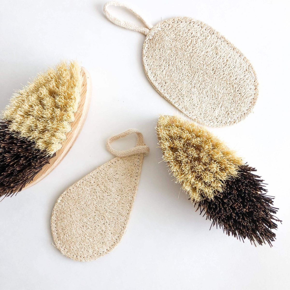 Bamboo Vegetable Brush - Smile Boutiques, versatile and durable brushes for cleaning fruits, vegetables, and cookware.