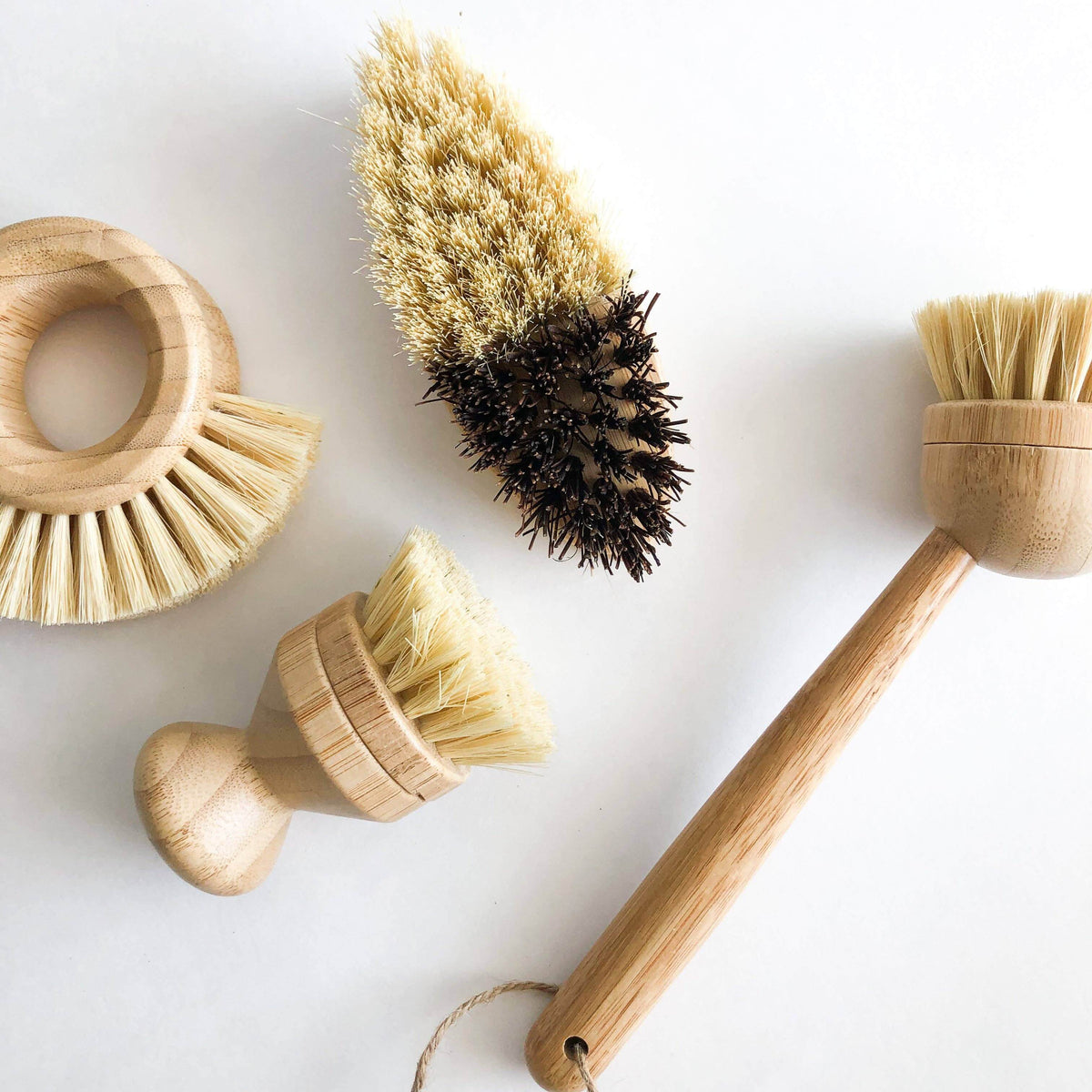 Bamboo Vegetable Brush - Smile Boutiques, eco-friendly cleaning brushes for kitchen and home use.