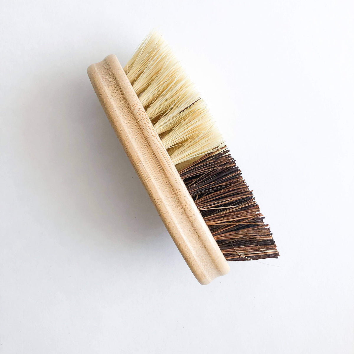 Bamboo Vegetable Brush - Smile Boutiques with dual-bristle design for effective cleaning of fruits and vegetables.