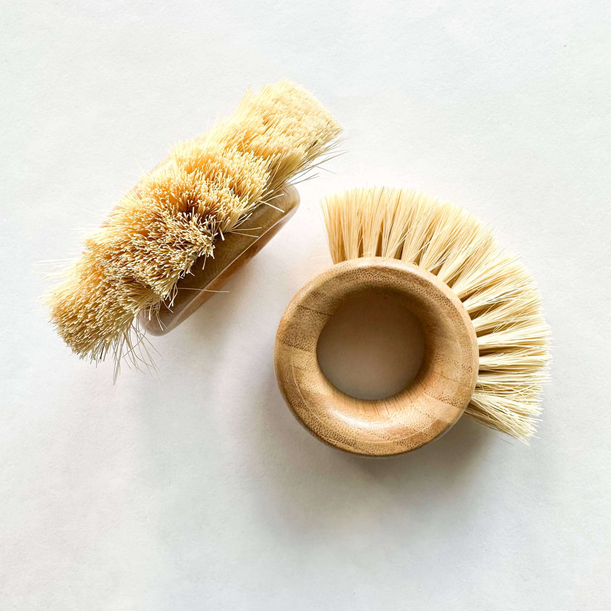 Bamboo Vegetable Brush - Smile Boutiques featuring dual-bristle design for effective cleaning of fruits and veggies.