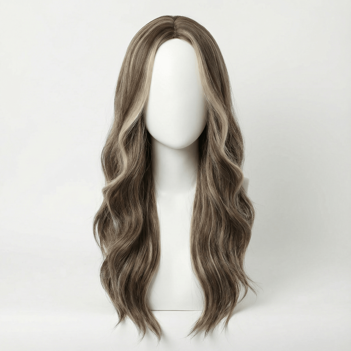 Brown wavy wig on a mannequin head against a white background