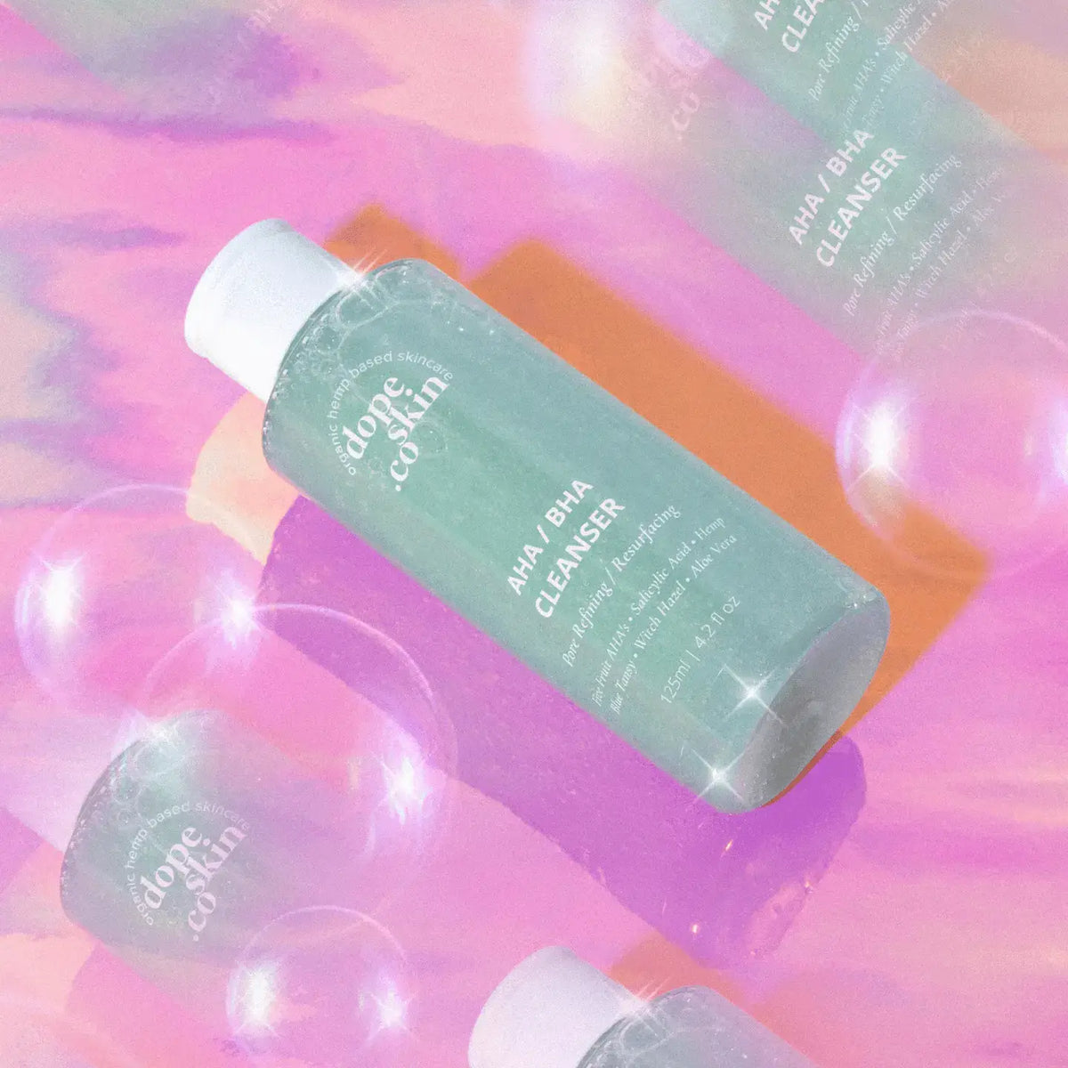 Green skincare bottle labeled 'dote' on a colorful, bubble-themed background