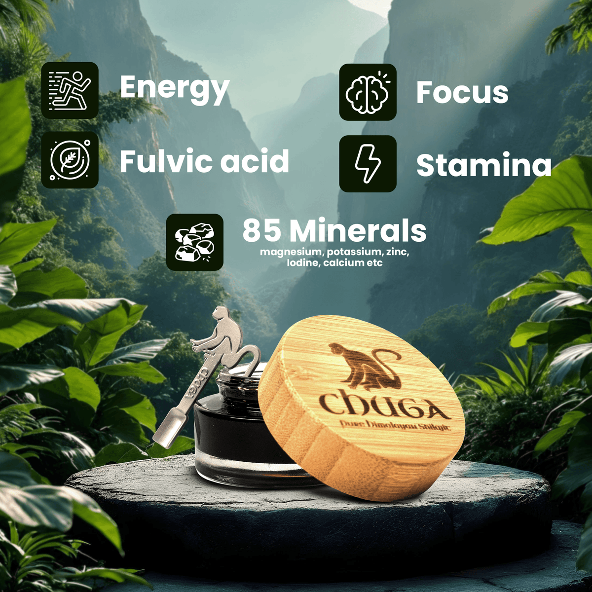 A jar of black hair oil with a light wood lid engraved with a monkey and the brand name 'CHUGA' is displayed on a stone pedestal in a lush green forest setting. Text overlays highlight key ingredients: Energy, Focus, Fulvic acid, Stamina, and 85 Minerals.