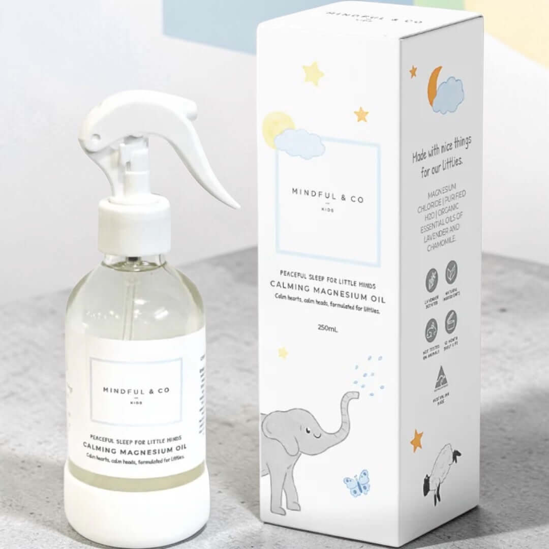 Bottle and box of Mindful & Co calming magnesium oil on a light background