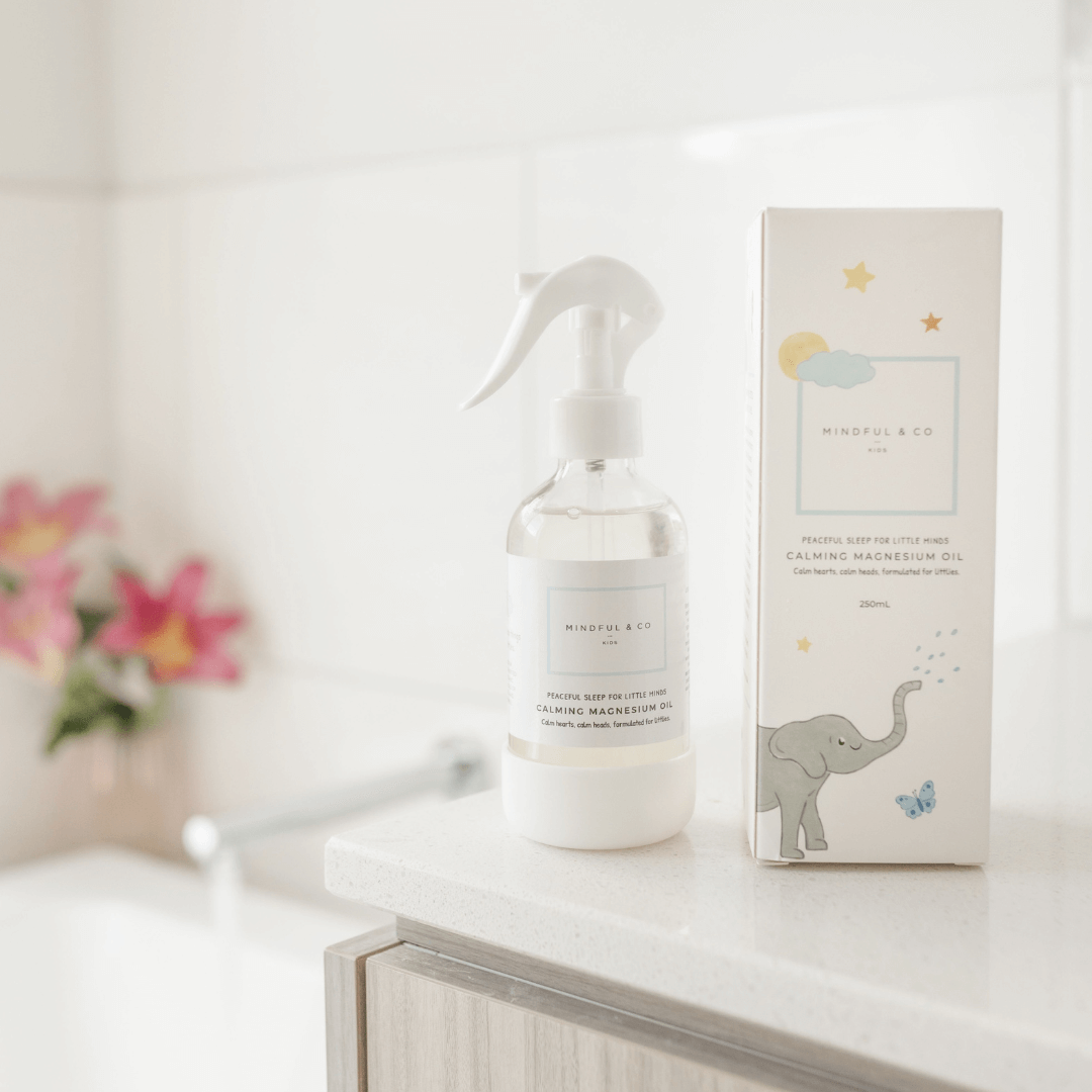 Spray bottle and packaging on a white surface with a blurred background