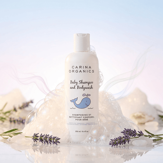 Carina Organics baby shampoo and bodywash bottle with lavender flowers on a light background