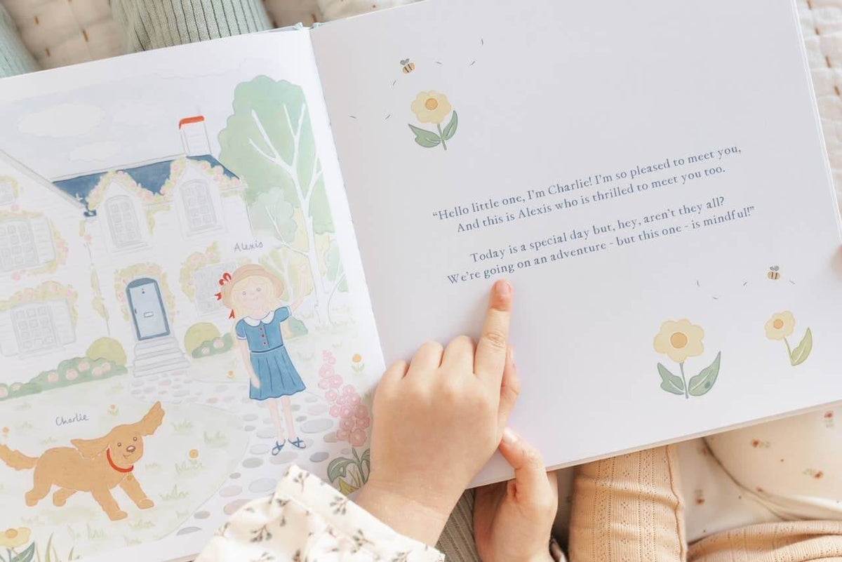 Charlie's Mindful Adventures By The Sea children's book illustration featuring Charlie and a young girl.