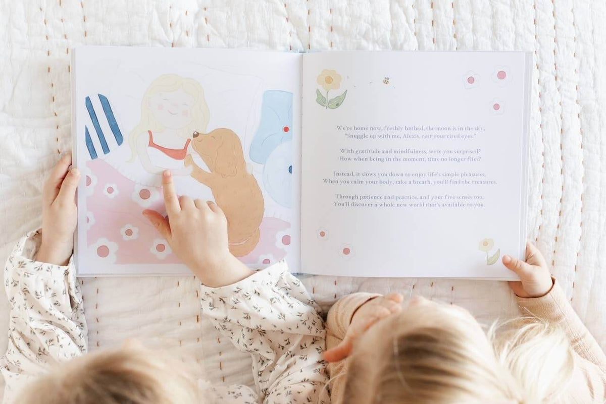 Children reading Charlie's Mindful Adventures By The Sea, exploring mindfulness through a colorful storybook.