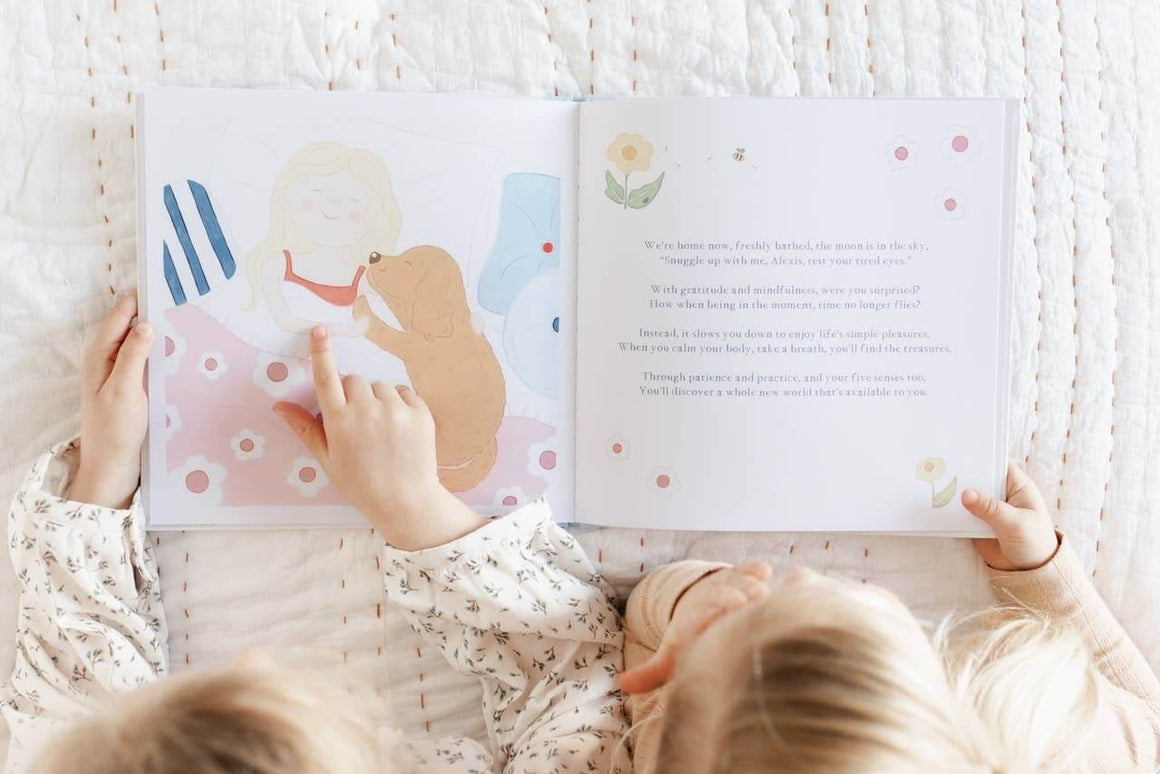 Children reading Charlie's Mindful Adventures By The Sea, exploring mindfulness through a colorful storybook.