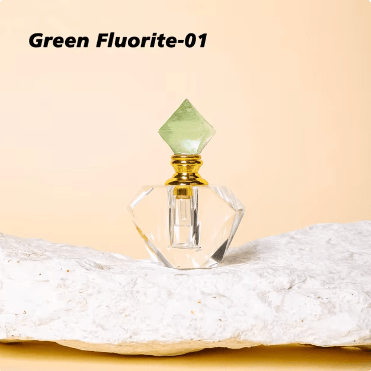 Crystal Gem Stone Essential Oil Bottle featuring a Green Fluorite gemstone top on a decorative base.