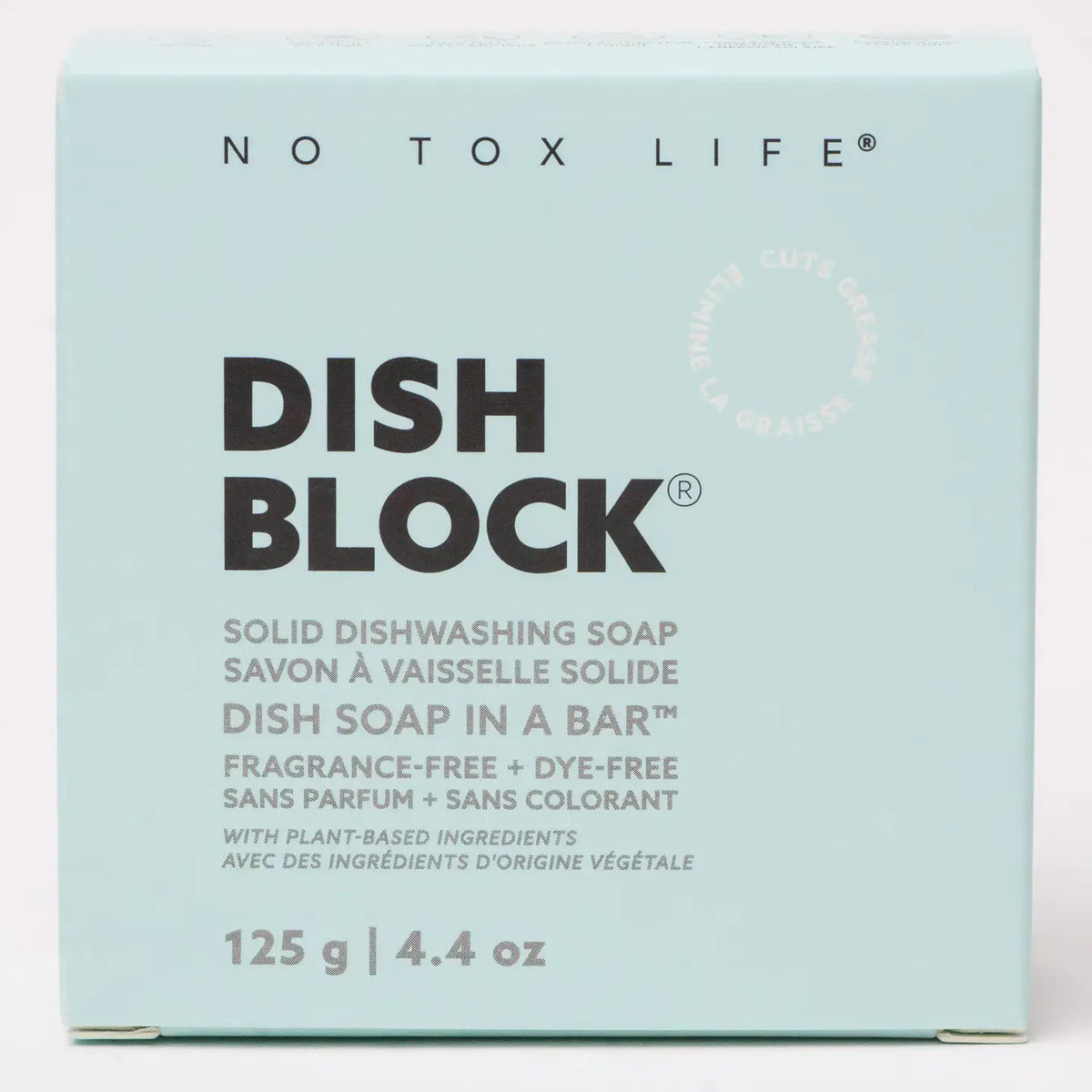 Box of No Tox Life Dish Block solid dishwashing soap on a light blue background