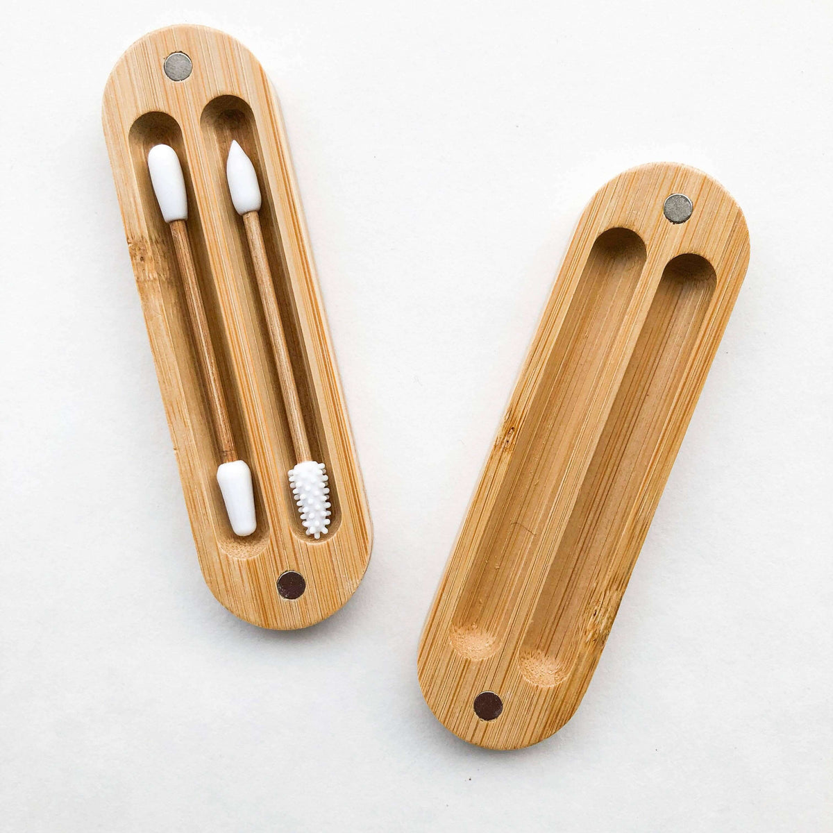 Wooden toothbrush holder with multiple toothbrushes on a white background