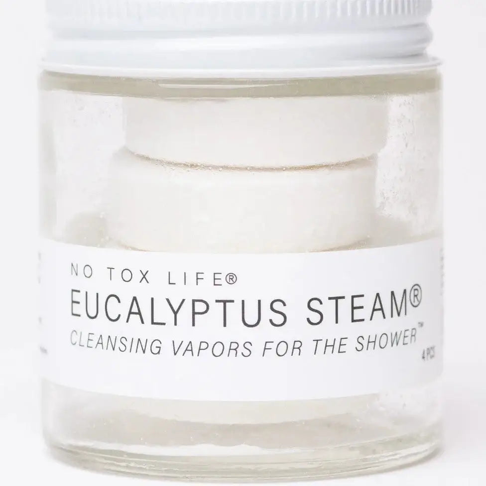 Jar of Eucalyptus Steam product with a white label on a white background