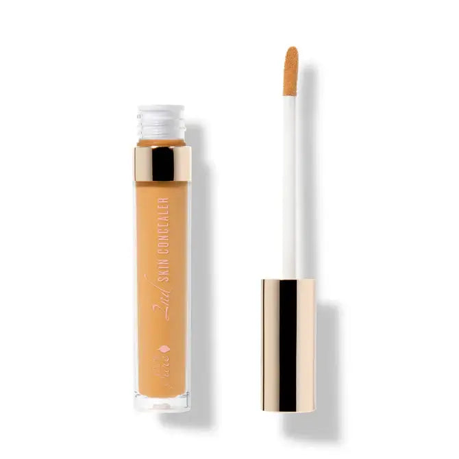 Fruit Pigmented® 2nd Skin Concealer tube and applicator for natural finish, featuring fruit pigmented concealer for natural finish.