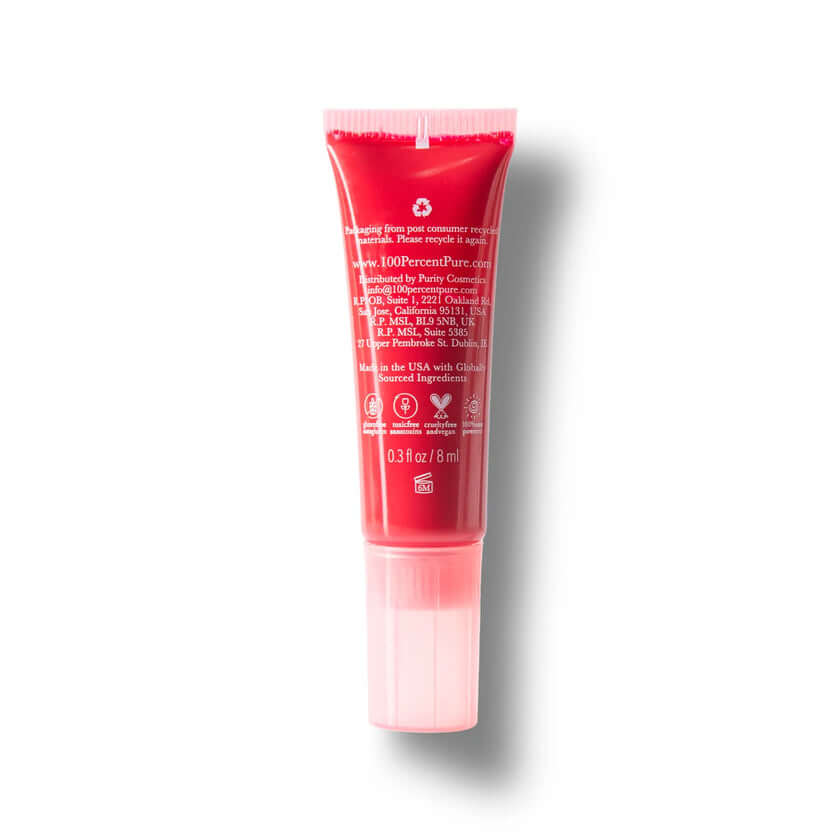 Red tube of lip balm on a white background