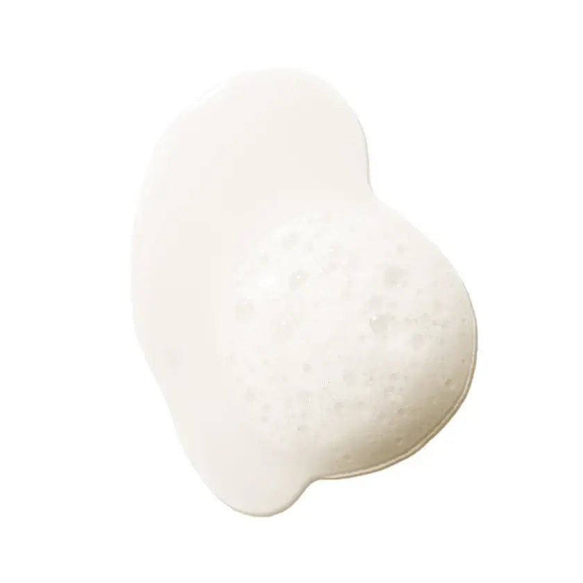 Repair Shampoo foamy texture showcasing its cleansing properties for restoring damaged hair.