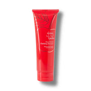 Red shampoo tube with 'Glossy Locks' branding on a white background