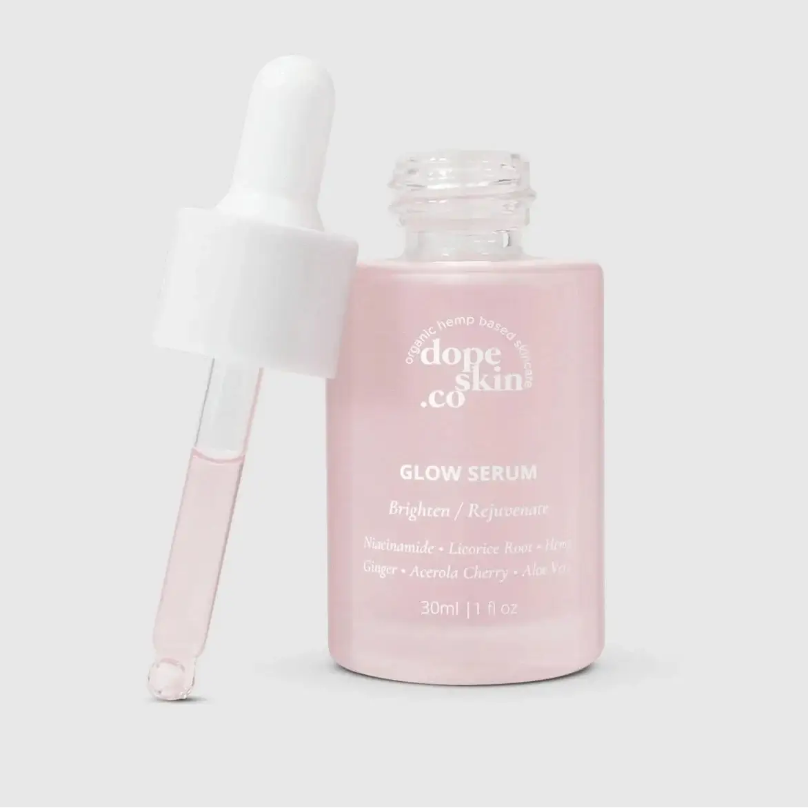 Glow Serum bottle with dropper, designed to brighten and rejuvenate skin, featuring a pink hue and natural ingredients.