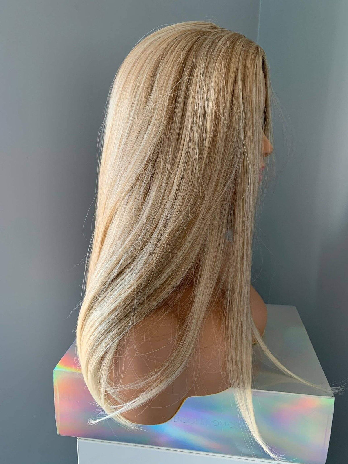 Silky Straight Blonde Wig showcasing medium golden blonde locks with soft dimension and a flattering centre part.