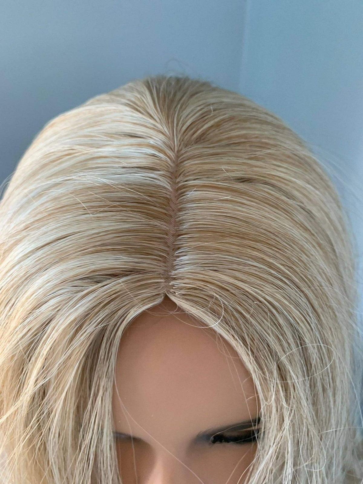 Top view of the Hailey Silky Straight Blonde Wig showing the sleek golden blonde strands.
