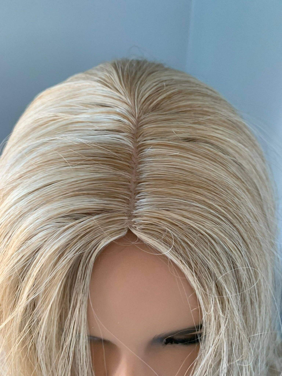 Top view of the Hailey Silky Straight Blonde Wig showing the sleek golden blonde strands.