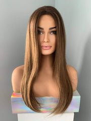 Holly Silky Straight Brown Wig displayed on a mannequin showcasing its sleek, glossy texture and long length.