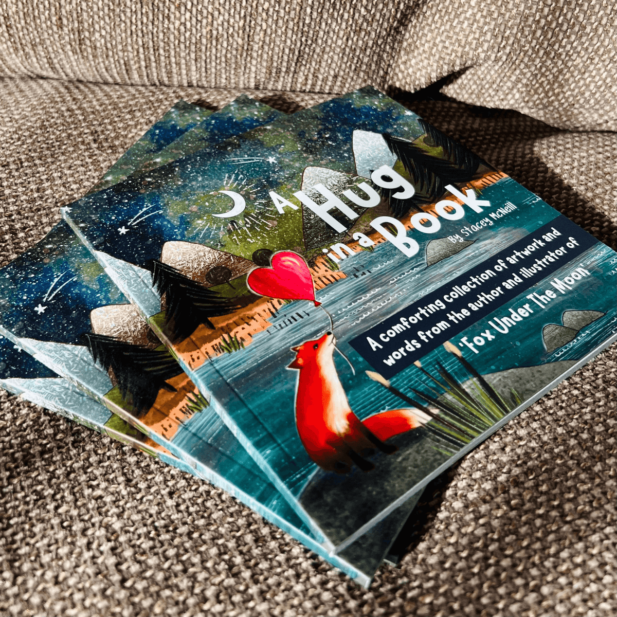 Hug In A Book mini book collection featuring vibrant illustrations and comforting words from Fox Under The Moon.