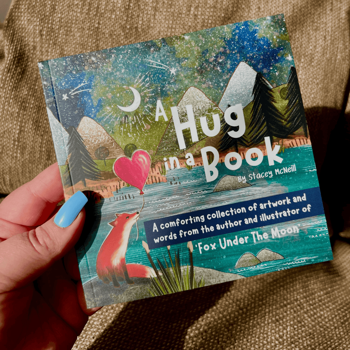 Hug In A Book mini book cover featuring uplifting artwork and illustrations from Fox Under The Moon.