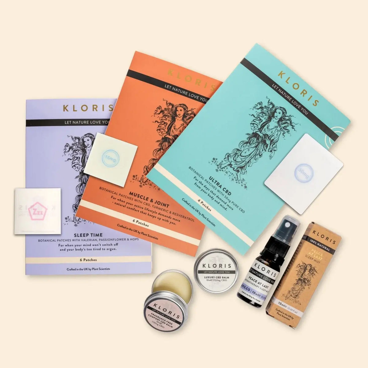 Collection of Kloris products including bottles, jars, and boxes on a beige background