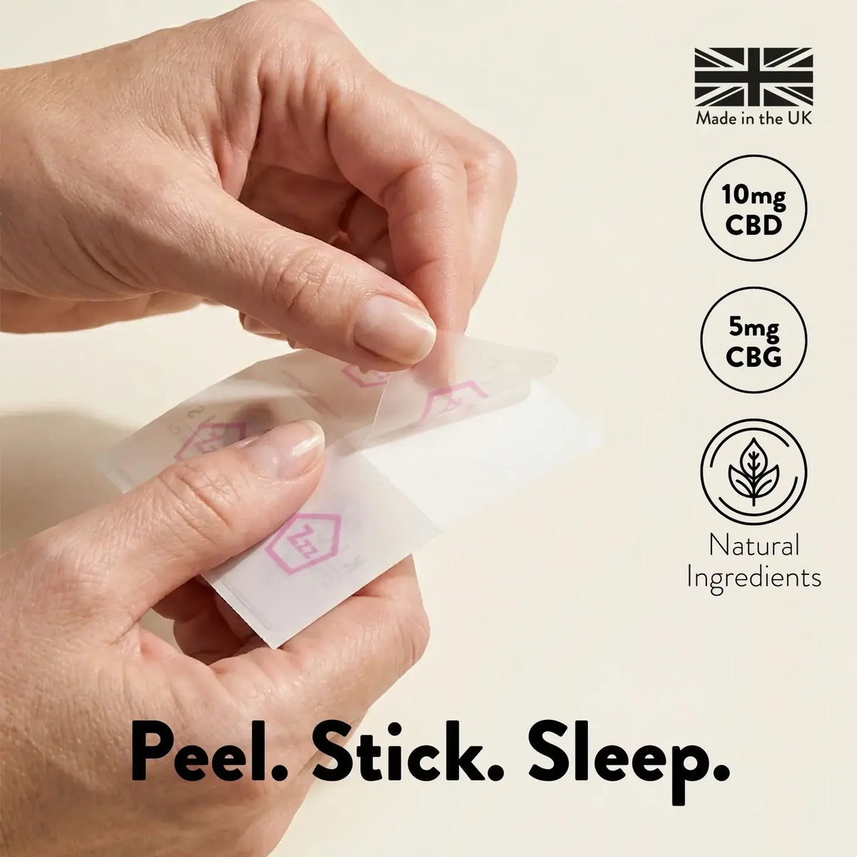 Hands peeling a small adhesive patch with product details on a light background