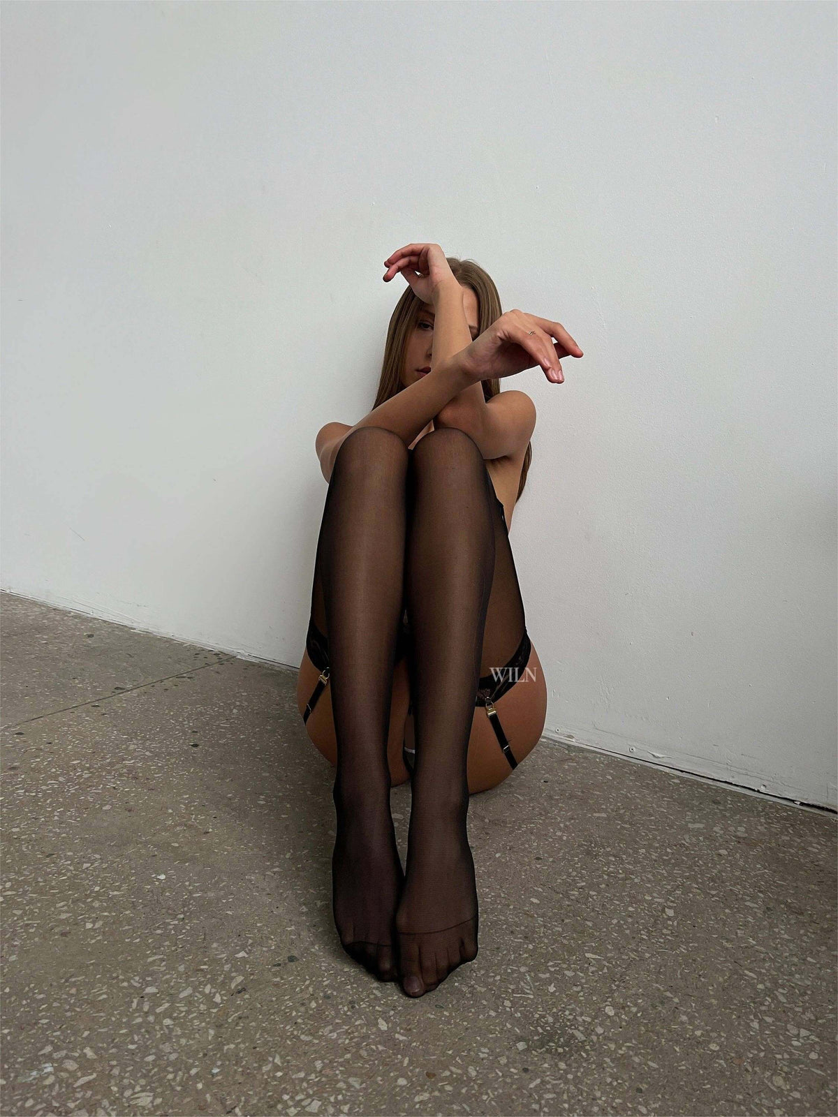 Lace Stockings in black, showcasing a sleek and elegant leg silhouette, ideal for enhancing lingerie looks.