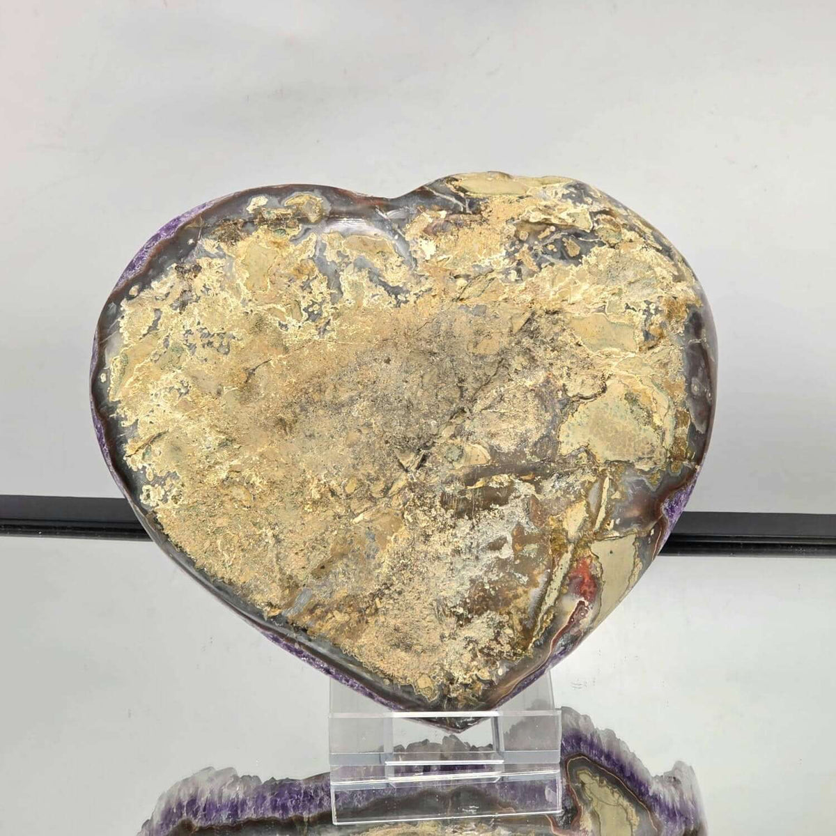 Large Amethyst Crystal Heart carved from natural Brazilian amethyst quartz.