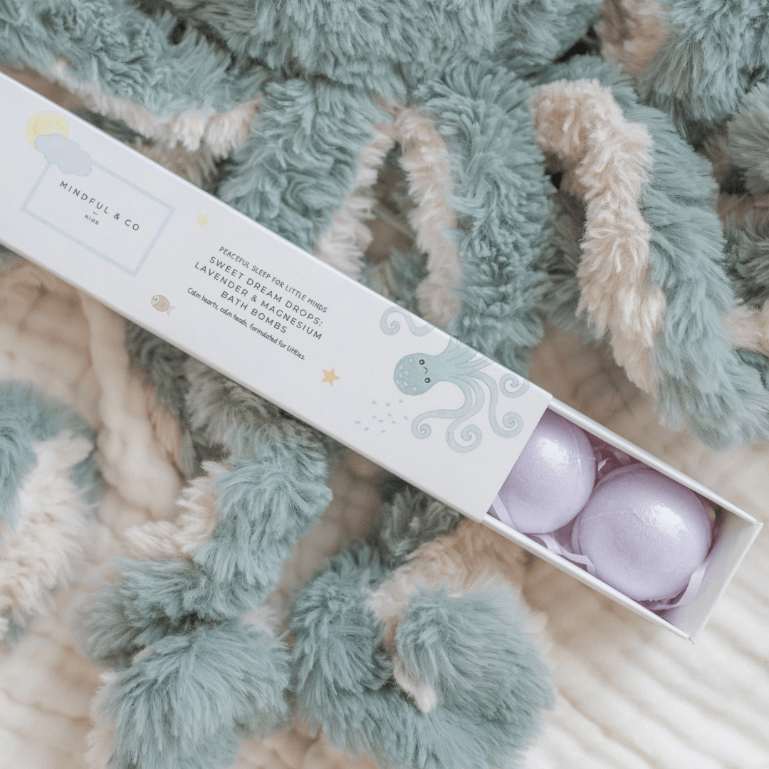 Box of bath bombs with a textured blanket background