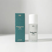 Magnesium Oil + Aloe Roller in a sleek bottle and box, providing targeted magnesium relief for muscle soreness.