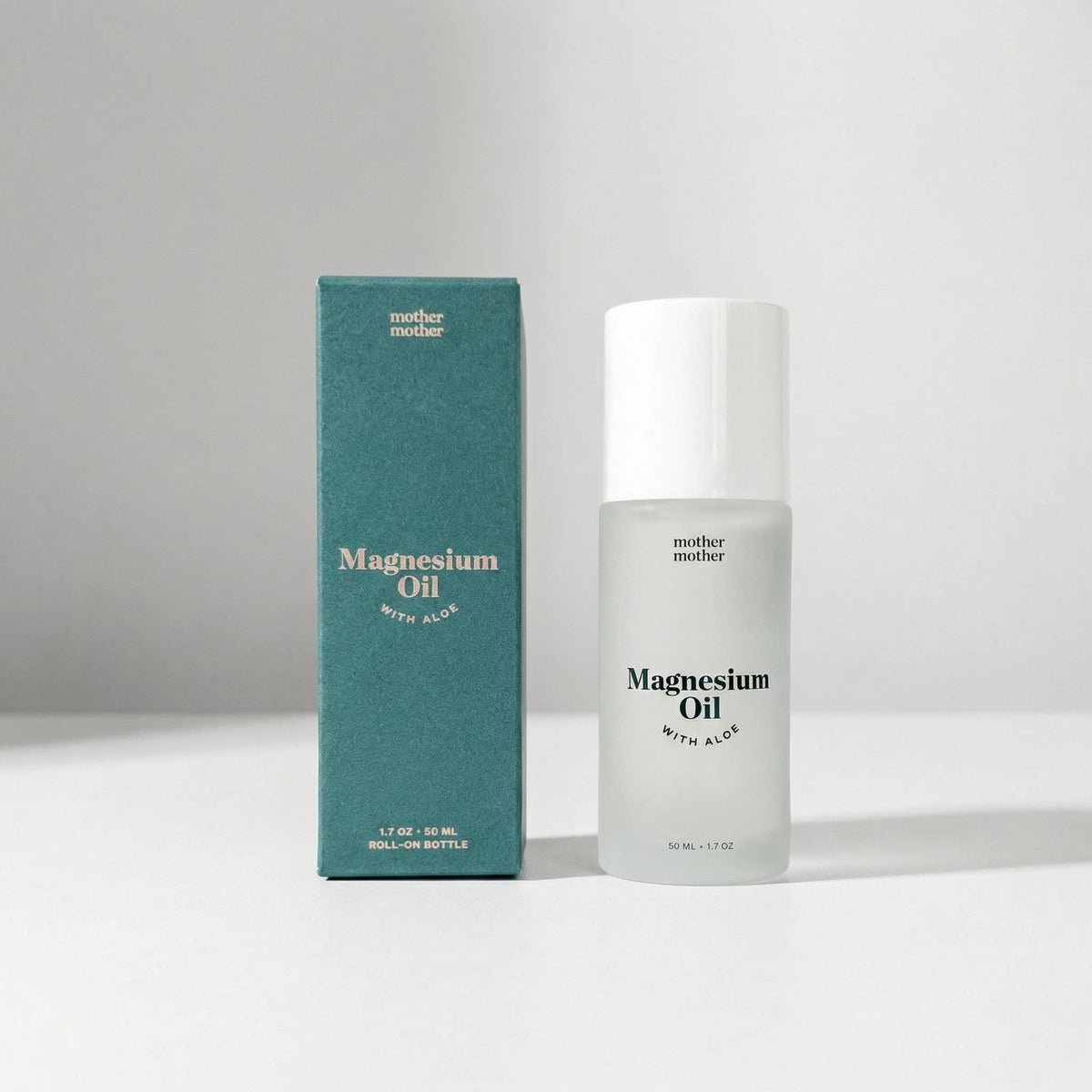 Magnesium Oil + Aloe Roller in a sleek bottle and box, providing targeted magnesium relief for muscle soreness.