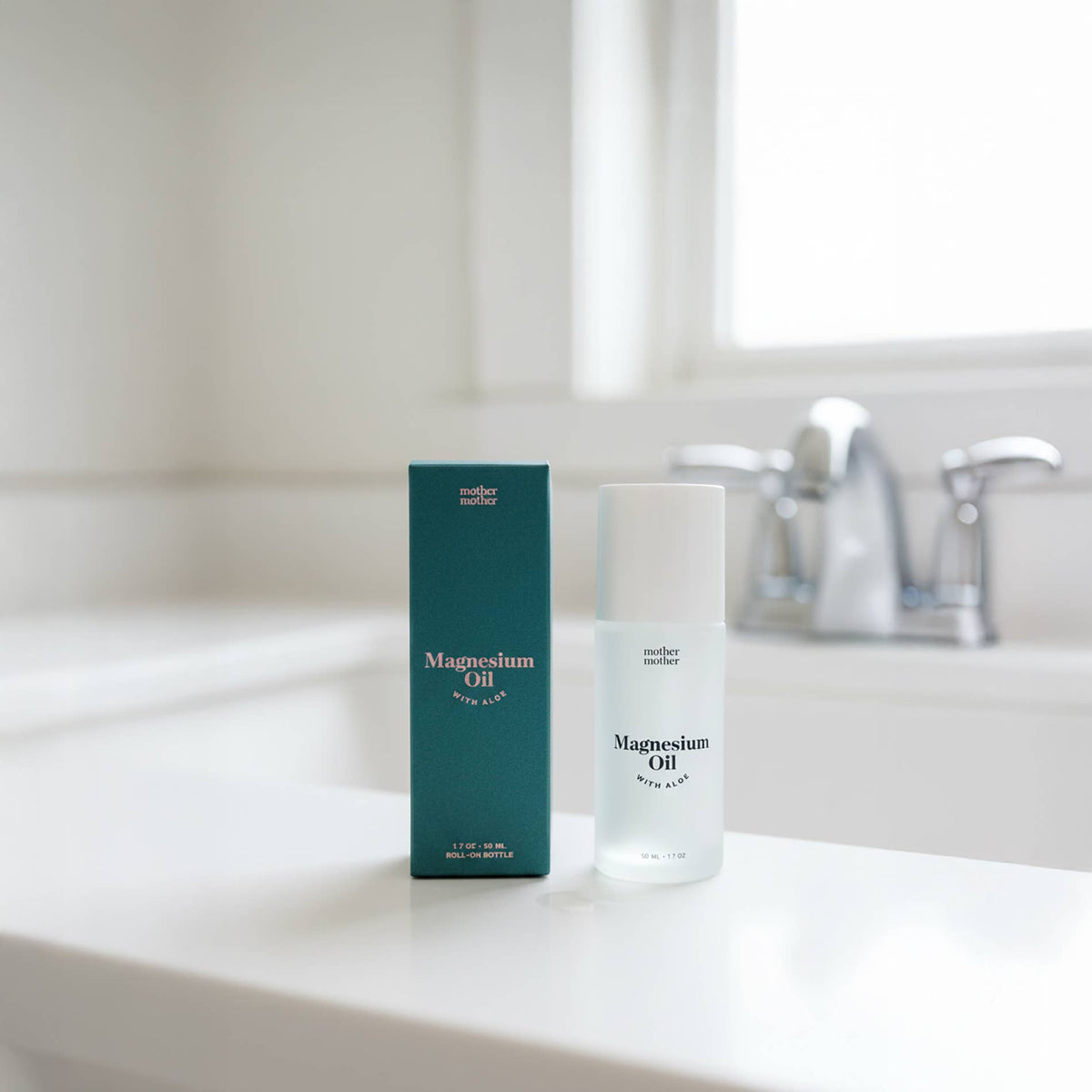 Magnesium Oil + Aloe Roller displayed on a bathroom counter for effective magnesium relief.