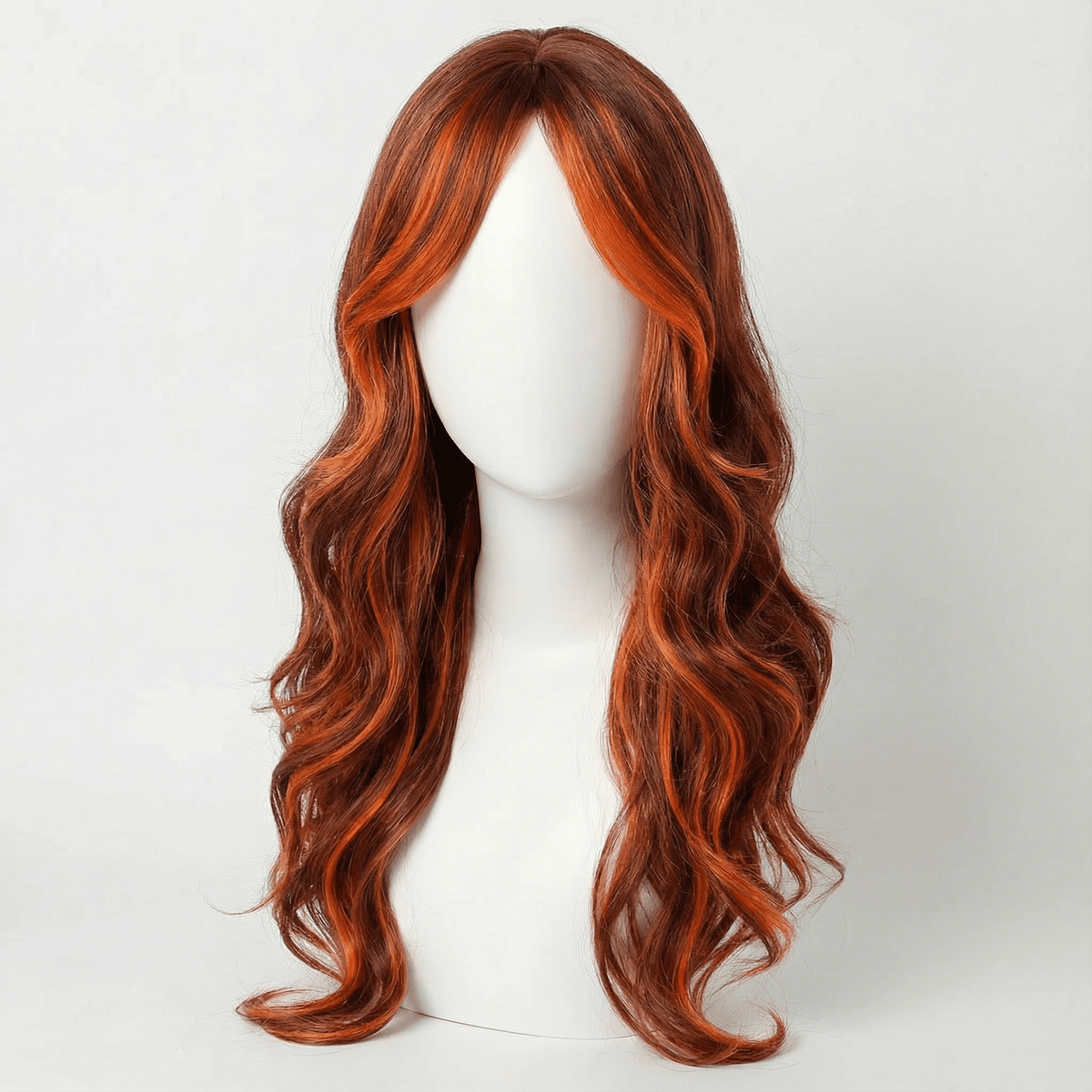 Maisie long black wig with orange highlights, showcasing wavy layers and vibrant orange color accents.