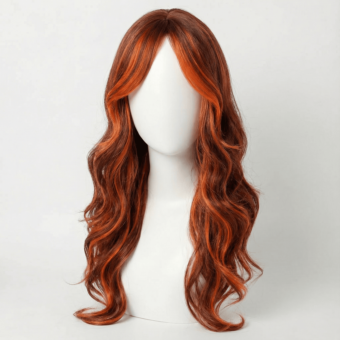 Maisie long black wig with orange highlights, showcasing wavy layers and vibrant orange color accents.