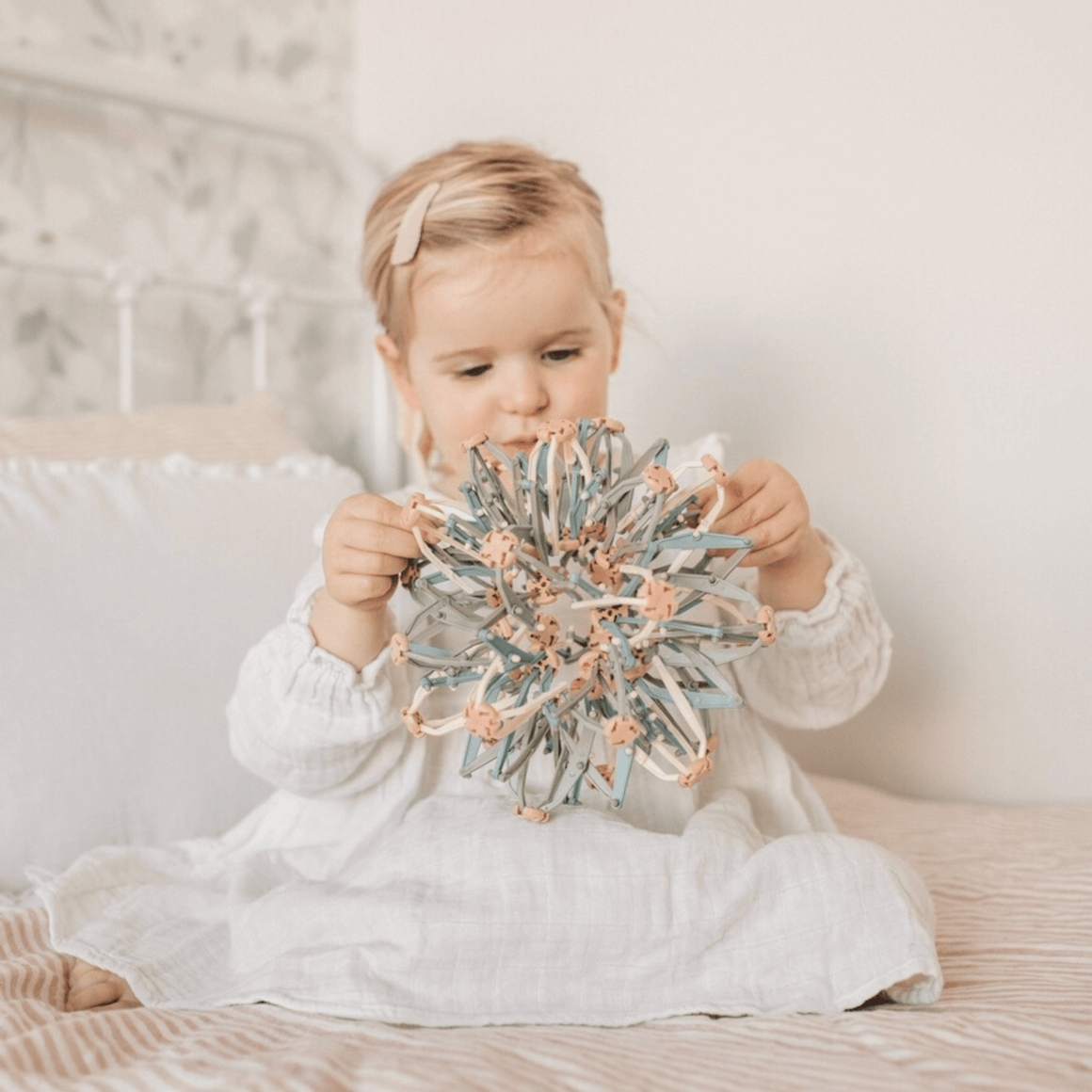 Child engaged with the Mindfulness Magic Ball, exploring mindful play and relaxation techniques.