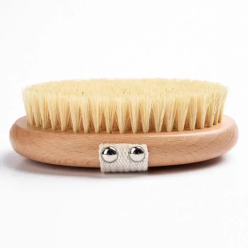 Sisal Bristle Body Brush - Smile Boutiques featuring natural sisal bristles on a wooden handle.