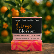 Orange Blossom Soap Bar - Soap Boutique, luxury cold process soap with vibrant colors and orange grove background.