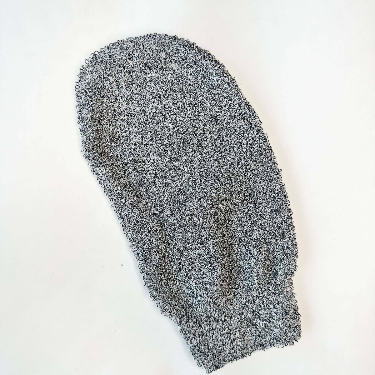 Gray textured object on a white background