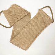 Beige woven bag on a white background